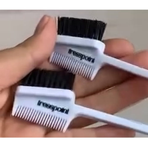 Two Tresspoint double-sided edge brushes in white, showing the firm black bristles for laying edges and the fine-tooth comb side